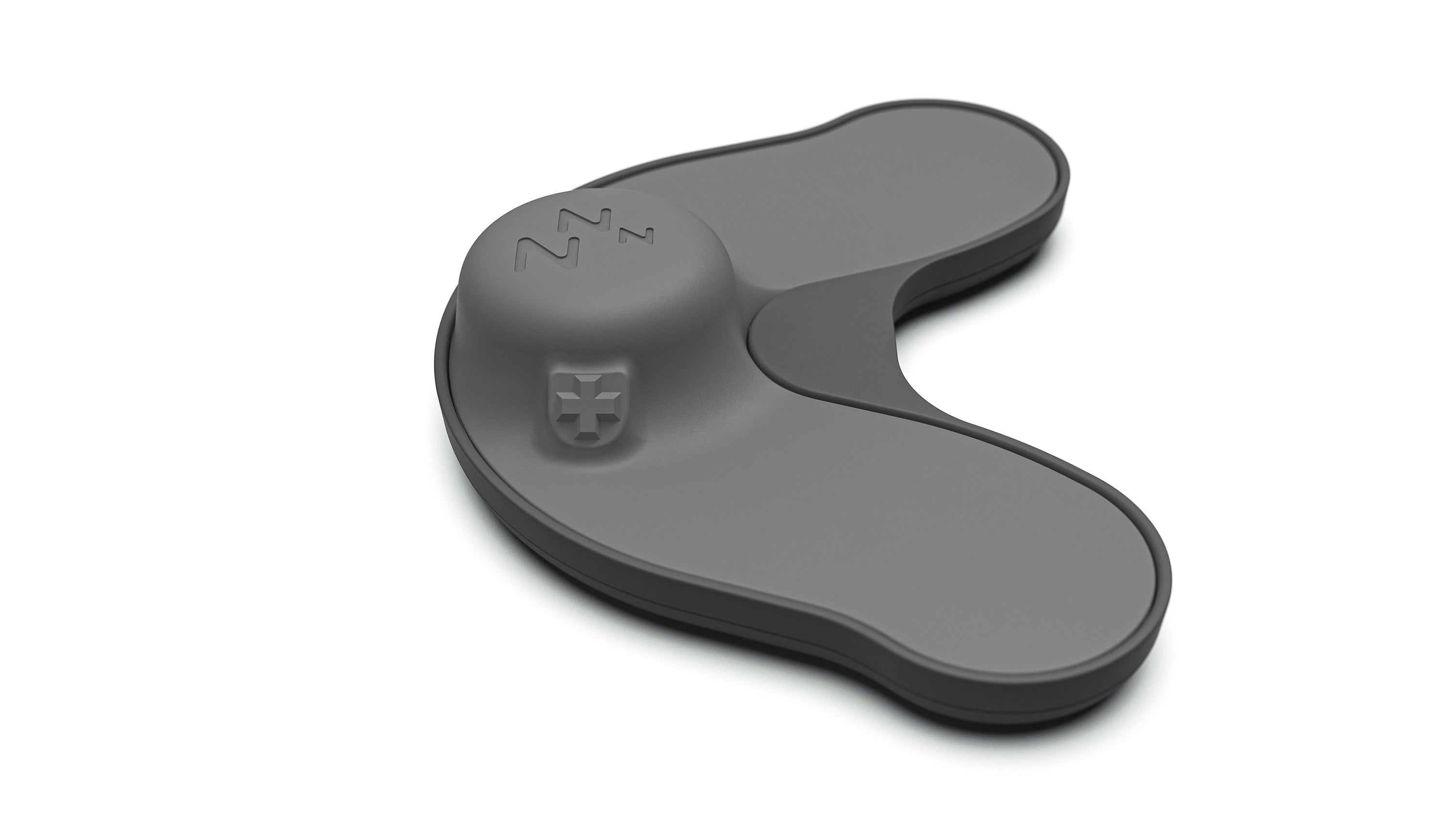 Zeus anti-snore device in its charger