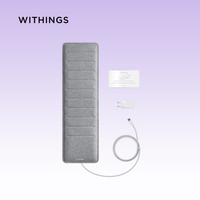 Zeus Withings Sleep Analyzer device showing sensors and sleek design on a white background for sleep monitoring.